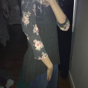 Baseball t-shirt with floral sleeves.